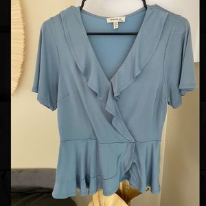 Faux wrap ruffled top.